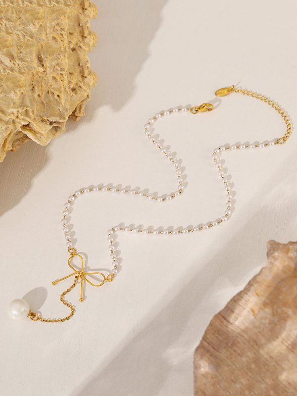 Stainless Steel Bow Pendant Necklace with Pearls For Sale